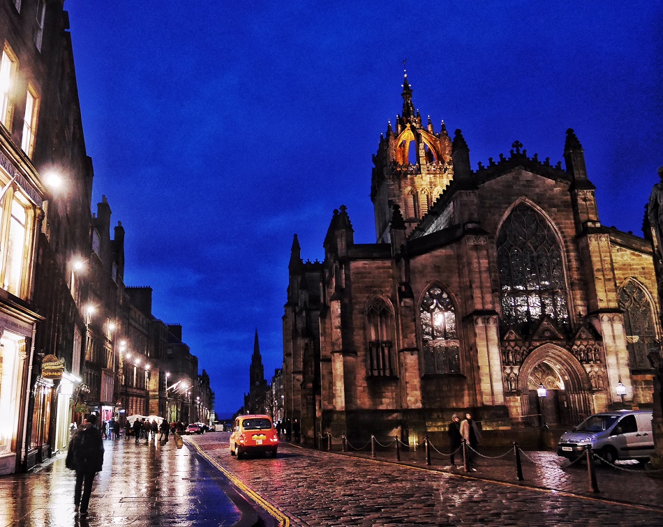 I shot this while I listened to the bagpiper breaking my heart on the Royal Mile. It's Giles Cathedral at dusk.
