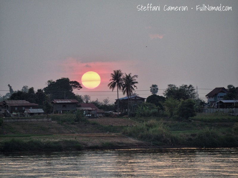 Strange eerie box-like sunset over the Mekong River