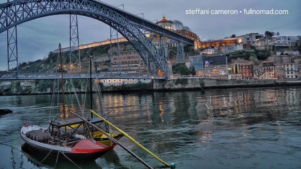 Moody Porto. I love this stunning bridge. Across the river are the port wine lodges/caves that have made Porto famous.