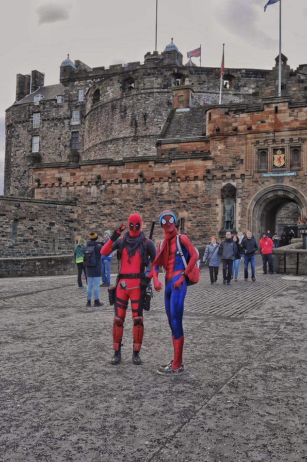 Spiderman and Deadpool hanging out at the Edinburgh Castle, as superheroes do.